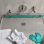 Hauteur mitigeur douche : repère 110 cm sur mur
